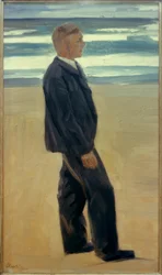 Giovane uomo davanti alle onde
