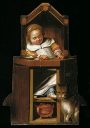 Bambino che dorme sul seggiolone