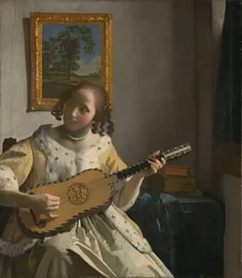 Giovane donna che suona una chitarra.[1]
Titoli alternativi:  

La chitarrista.[2]