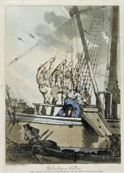 Scarico del carbone da una nave da carico e da un battello a vapore