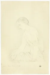 Statua di ragazza seduta