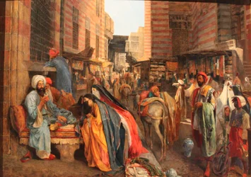 Francese: La Rue et la mosquée al-Ghouri au Caire Scena di strada vicino alla moschea El Ghouri al Cairo