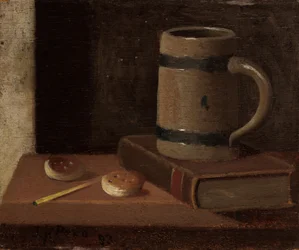 Tazza, libro, biscotti e fiammiferi