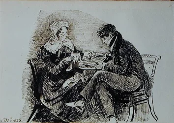 Uomo e donna che leggono a un tavolo