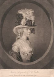 Giovane donna con cappello piumato