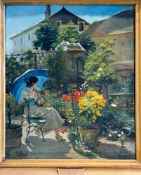 Nel giardino. Una giovane donna con un ombrello circondata da fiori