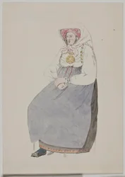 Donna seduta in costume locale