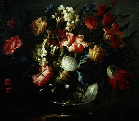 Tulipani, garofani e narcisi in un vaso di vetro