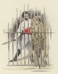 Leone e domatore di leoni in una gabbia
