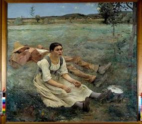 Fieno. Una donna seduta sull