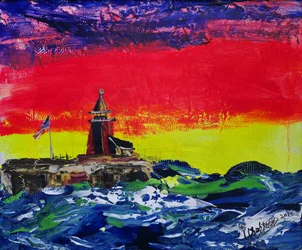 Tramonto dai colori vivaci al faro