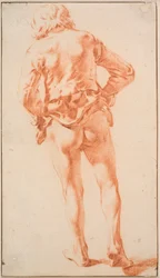Un uomo mezzo nudo, visto di spalle