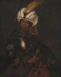 Un uomo con turbante e armatura
