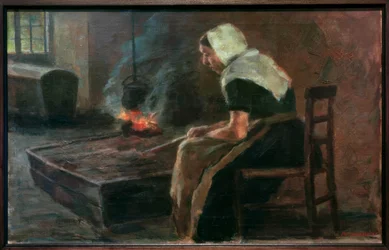 Donna davanti al focolare aperto