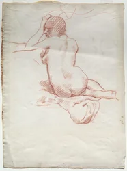 Nudo femminile seduto di schiena