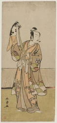 Bando Hikosaburo III con un burattino a mano