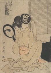 Takashima Ohisa usa due specchi per osservare la sua acconciatura, ca. 1795