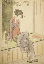 Donna seduta sulla veranda