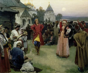 Danza (una coppia di giovani sposi in costume tradizionale danza tra la folla dei paesani al calar della notte)