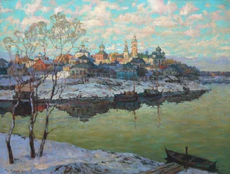 Inizio primavera, una città al fiume