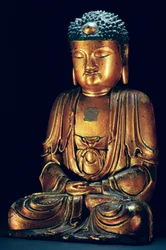 Una figura del Buddha seduto (lacca dorata)