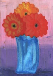 Fiori colorati in un vaso blu