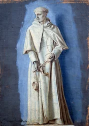 San Giovanni de Matha in piedi con catene in mano