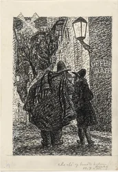 Due uomini per strada al buio