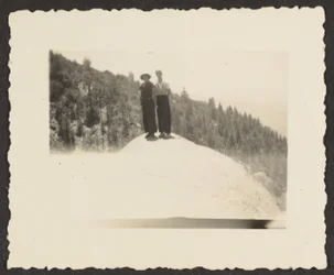 [Figure Standing on Rock]