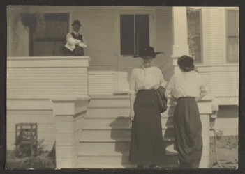 [Figure in veranda]