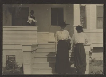 [Figure in veranda]