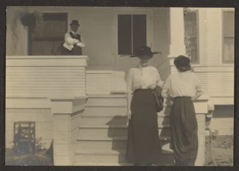 [Figure in veranda]