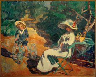 Il bambino sul triciclo