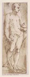 Giovane con mantello in piedi in una nicchia