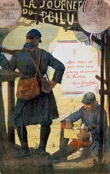 Due soldati francesi che esaminano pacchi di assistenza inviati da casa