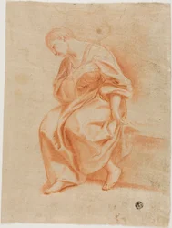 Donna seduta di profilo