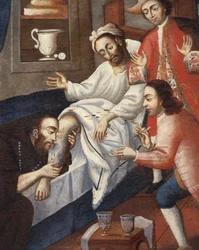 Religiosi che curano un paziente all