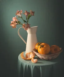 Mandarini e fiori rosa
