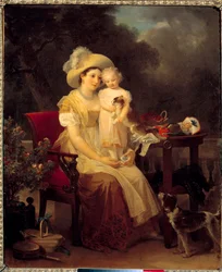 Donna seduta con una bambina sulle ginocchia