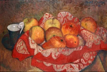 Mele e pere su un panno rosso