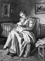 Una madre che coccola il suo bambino