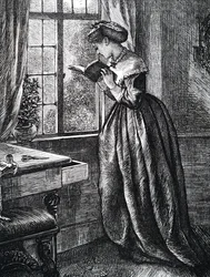 Una giovane donna che legge vicino a una finestra aperta