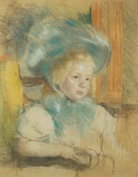 Simone con un cappello piumato