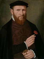 Ritratto di un uomo con la mano destra che tiene un garofano rosso e nella sinistra un guanto