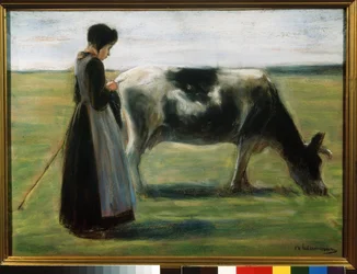Una ragazza con una mucca