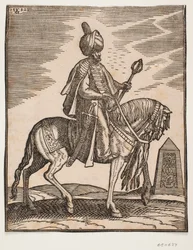 Cavaliere con turbante con una spada al fianco destro e una mazza da guerra nella mano sinistra, profilo verso destra; sullo sfondo, un obelisco