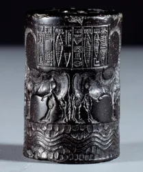 Mesopotamia: sigillo cilindrico in marmo nero a nome del divino Sharkali-Sharri (Shakalisharri), re di Agade, ornato con eroi che abbeverano bufali schiena contro schiena. 2300 a.C. Parigi, Museo del Louvre