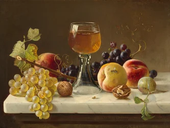 Tavolo in marmo con frutta e bicchieri da vino