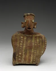 Figura femminile seduta