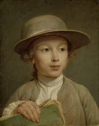 Ragazzo con un libro da disegno